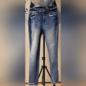 Stone washed stretch straight leg jeans.